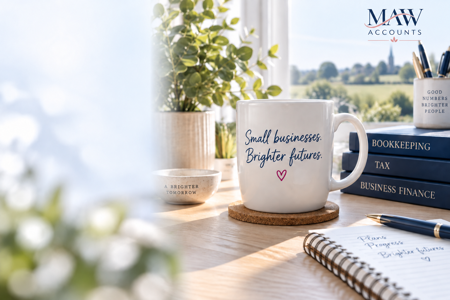 A welcoming desk with a notebook and a mug